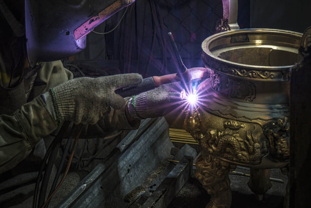 6 Hidden Gems for Photographers in Vietnam hidden Bronze Crafting Hanoi Craft Village